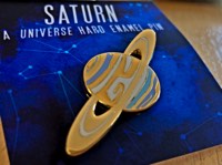 Saturn (pin badge)